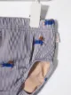 Tiny Cottons shorts de playa con motivo Doggy Paddle