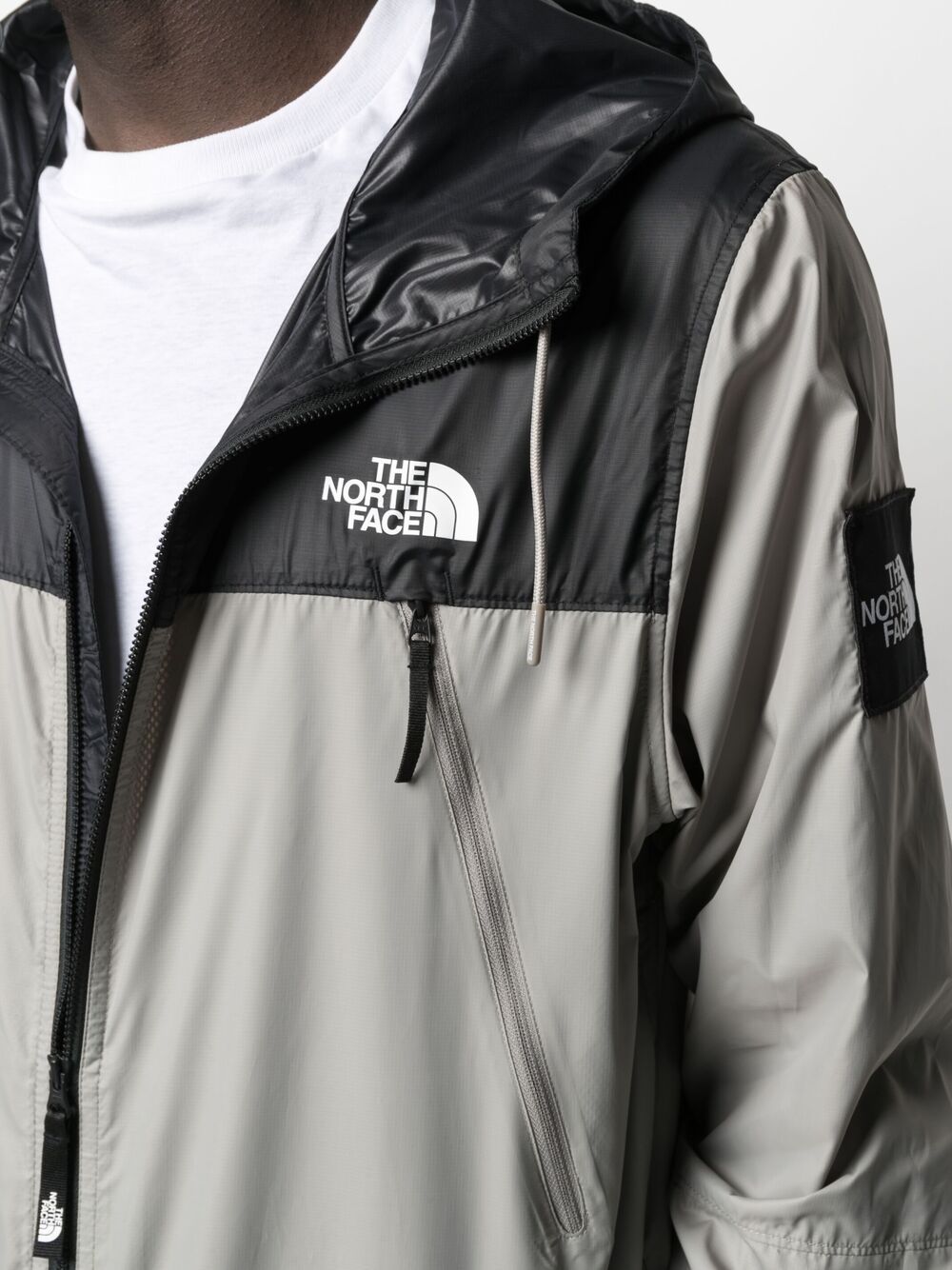 фото The north face двухцветная куртка с капюшоном