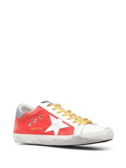 Shop white & red Golden Goose Super-Star low-top sneakers with Express ...
