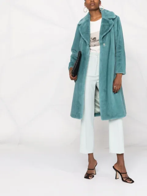 teal green coat