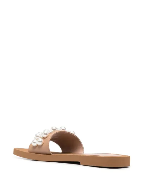 Shop Stuart Weitzman Goldie faux-pearl embellished slides with Express Delivery - FARFETCH