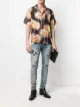 Image 2 of AMIRI embroidered-logo ripped-detail jeans
