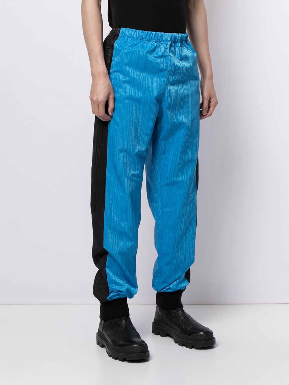 Shop Marine Serre Satin-finish Track Pants In Blue