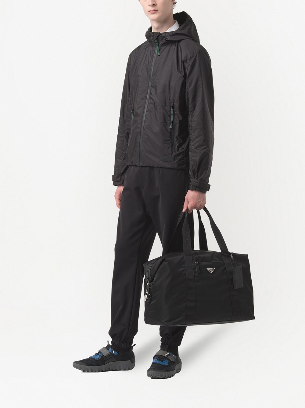 Shop Prada Re-nylon Triangle Logo Holdall Bag In Black