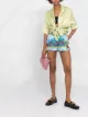 Image 2 of Versace shell-print silk shorts