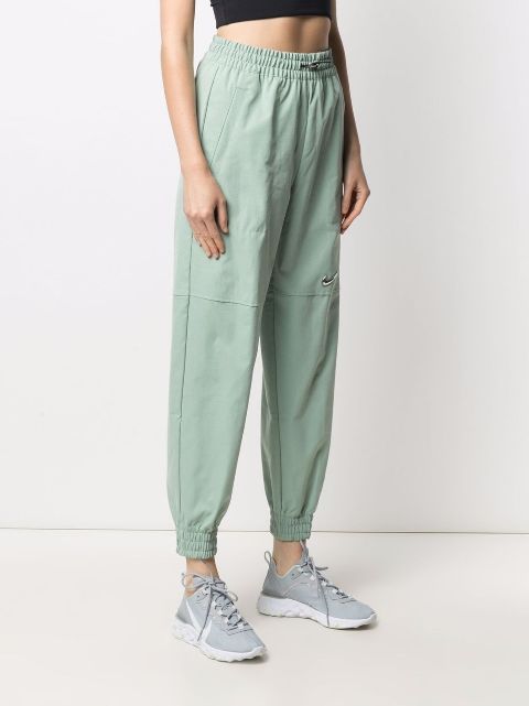 women's woven swoosh trousers