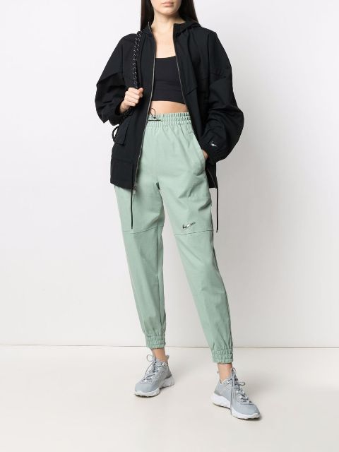 women's woven swoosh trousers