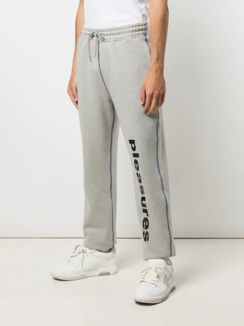 pleasures track pants