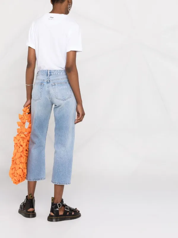 Shop GANNI cropped denim jeans with 