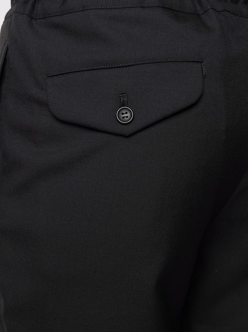 Shop Black Comme Des Garçons Flap-pocket Wool Trousers In Schwarz
