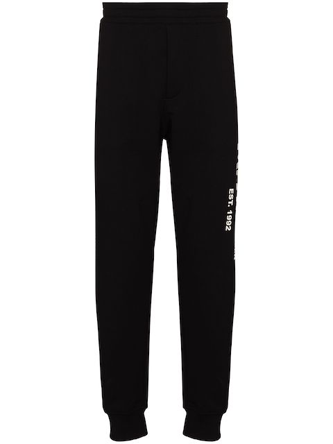 Alexander McQueen pants con estampado de grafiti