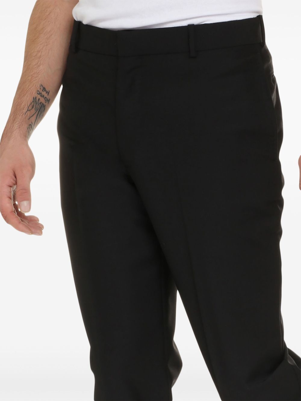 Alexander McQueen pressed-crease tailored trousers Men