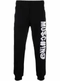 Moschino Symbols logo-embroidered fleece track pants - Black