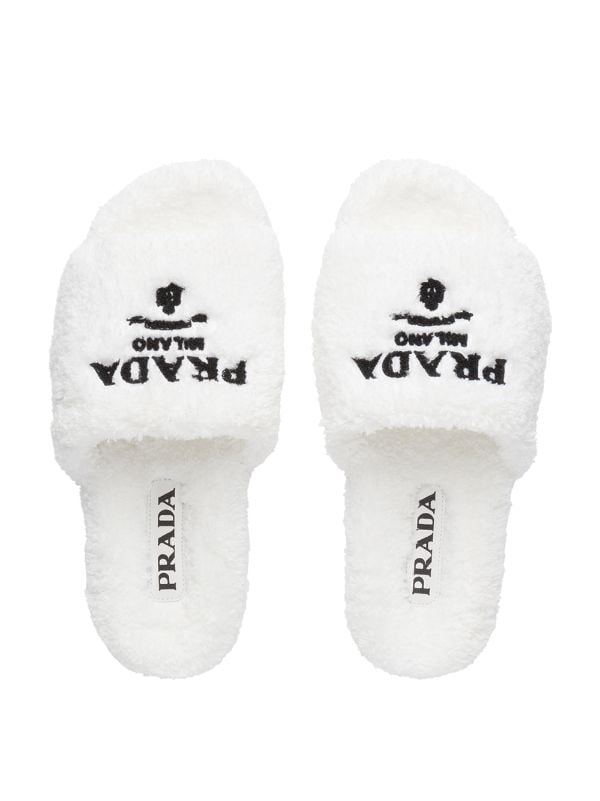 Shop Prada logo-embroidered slippers with Express Delivery - FARFETCH
