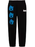 Natasha Zinko Anarchy-print track pants - Black