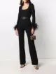 Imagen 2 de Saint Laurent jumpsuit con plumas en los puños