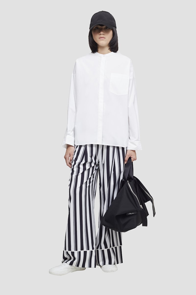 Striped PJ Pant-white #0 Striped PJ Pant, White/midnight blue Playtime PJ trousers from 3.1 PHILLIP LIM featuring candy stripe pattern, elasticated waistband, drawstring fastening, two side slit pockets, rear welt pocket, wide leg and turn-up cuffs.- 0