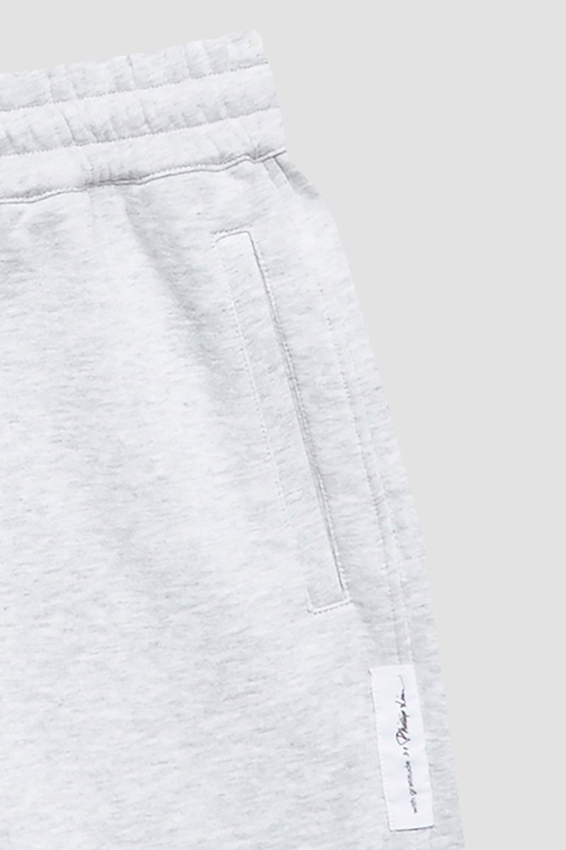 The Everyday Short-grey #1 The Everyday Short, Light heather grey cotton Everyday rolled cotton shorts from 3.1 PHILLIP LIM featuring logo patch to the side, elasticated drawstring waistband, two side slash pockets and turn-up cuffs.- 7