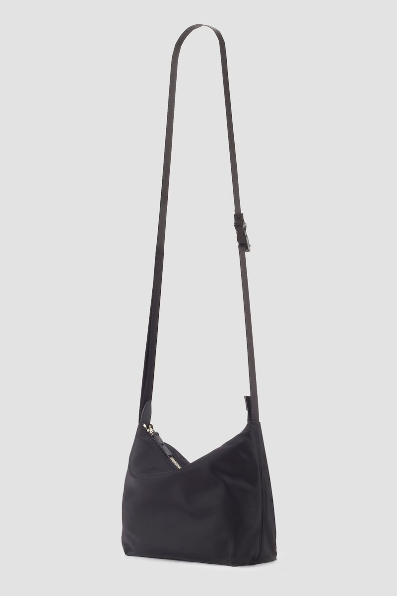 The Deconstructed Sling Bag-black #0 The Deconstructed Sling Bag, Black deconstructed utility sac crossbody bag from 3.1 PHILLIP LIM featuring logo patch to the side, top zip fastening and adjustable shoulder strap.- 2