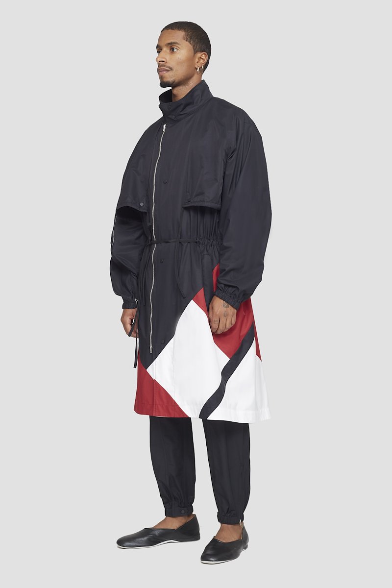 Fishtail Parka-black #1 Fishtail Parka, colour-block drawstring parka from 3.1 PHILLIP LIM featuring black/red, cotton blend, colour-block design, stand-up collar, front press-stud and zip fastening, drawstring waist, long sleeves, cuff zips, two side inset pockets and fishtail design.- 3