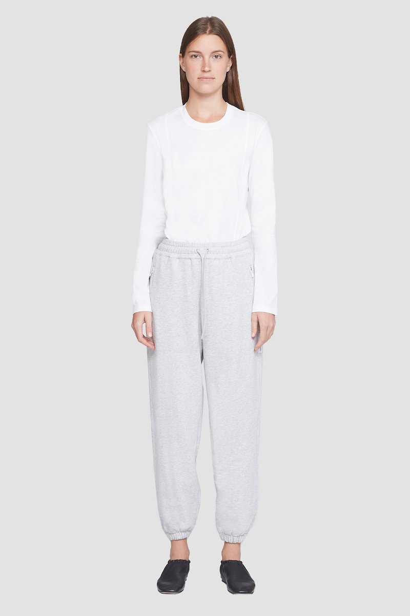 The Everyday Sweatpant-grey #1 The Everyday Sweatpant, Light heather grey cotton The Everyday track pants from 3.1 PHILLIP LIM featuring jersey fleece, logo patch to the side, elasticated ankles, elasticated drawstring waistband and two side zip-fastening pockets.- 1