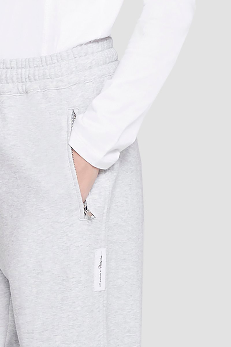 The Everyday Sweatpant-grey #0 The Everyday Sweatpant, Light heather grey cotton The Everyday track pants from 3.1 PHILLIP LIM featuring jersey fleece, logo patch to the side, elasticated ankles, elasticated drawstring waistband and two side zip-fastening pockets.- 4