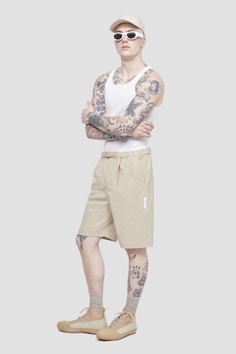 Kickin' It Short-neutrals #0 Kickin' It Short, Khaki beige Kickin It knee-length shorts from 3.1 PHILLIP LIM featuring logo patch to the side, elasticated drawstring waistband, two side slit pockets, two rear welt pockets and knee-length.- 2