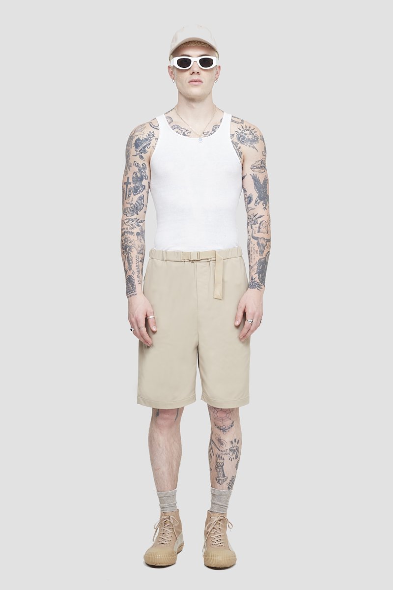 Kickin' It Short-neutrals #1 Kickin' It Short, Khaki beige Kickin It knee-length shorts from 3.1 PHILLIP LIM featuring logo patch to the side, elasticated drawstring waistband, two side slit pockets, two rear welt pockets and knee-length.- 1