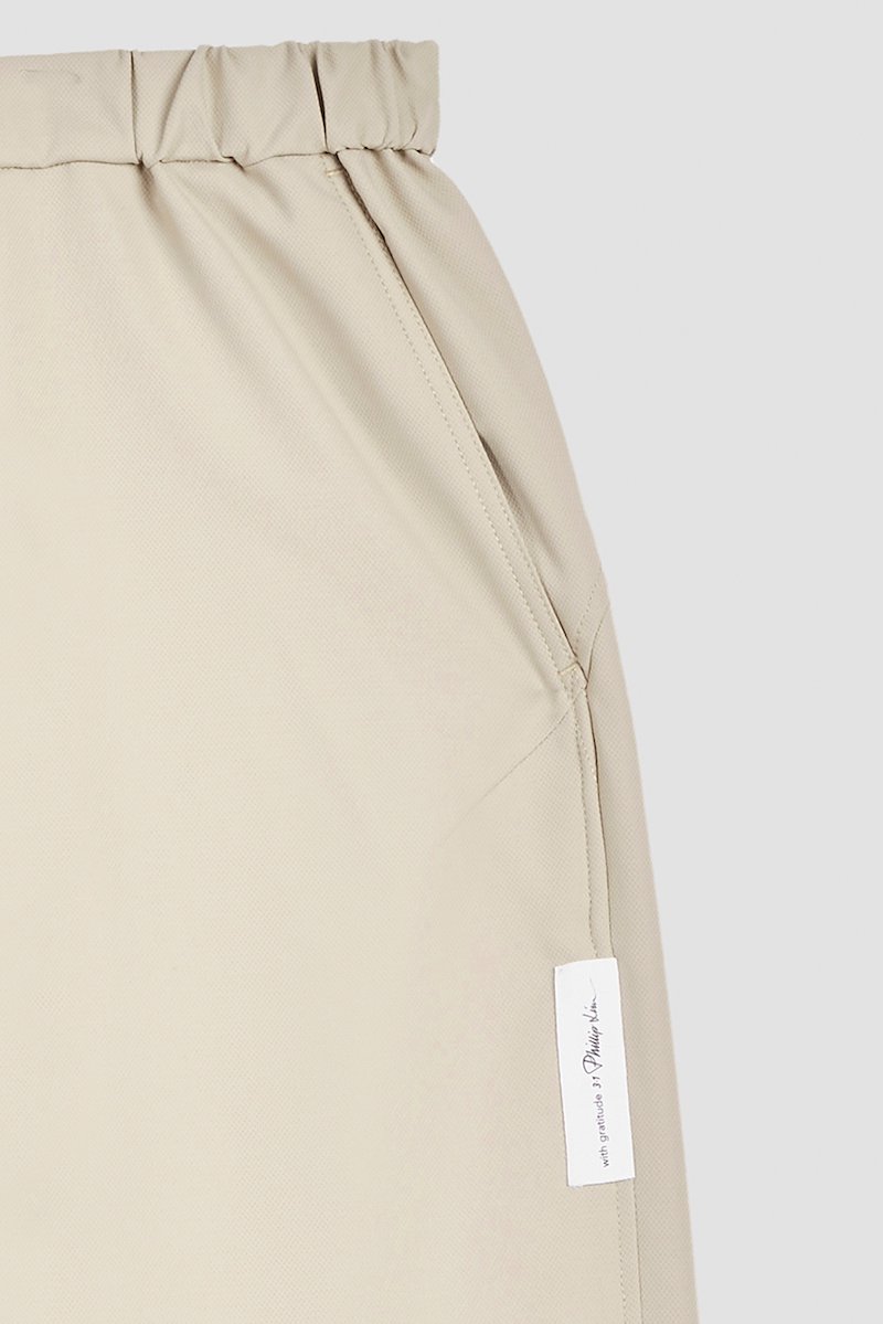 Kickin' It Short-neutrals #0 Kickin' It Short, Khaki beige Kickin It knee-length shorts from 3.1 PHILLIP LIM featuring logo patch to the side, elasticated drawstring waistband, two side slit pockets, two rear welt pockets and knee-length.- 8