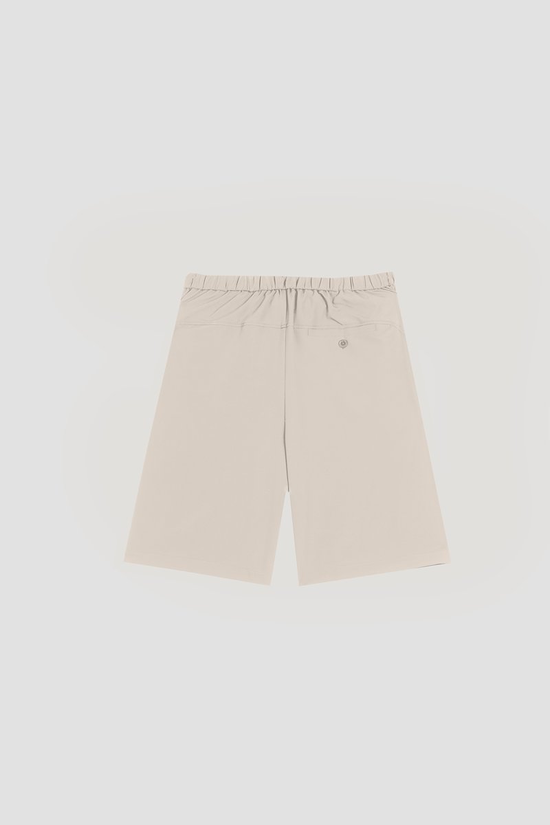 Kickin' It Short-neutrals #1 Kickin' It Short, Khaki beige Kickin It knee-length shorts from 3.1 PHILLIP LIM featuring logo patch to the side, elasticated drawstring waistband, two side slit pockets, two rear welt pockets and knee-length.- 7