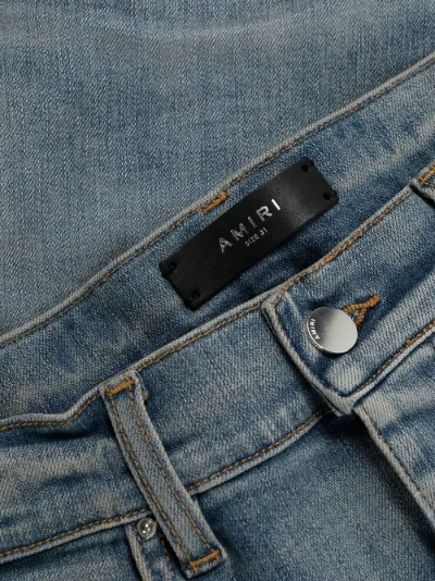 quilted patch-detail slim-fit jeans 