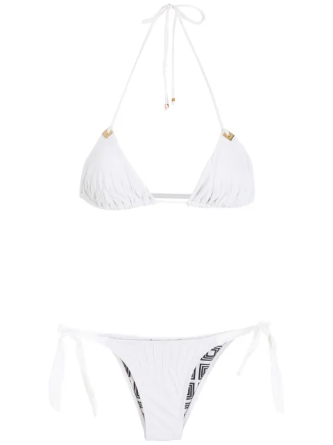 Amir Slama bikini à dos-nu