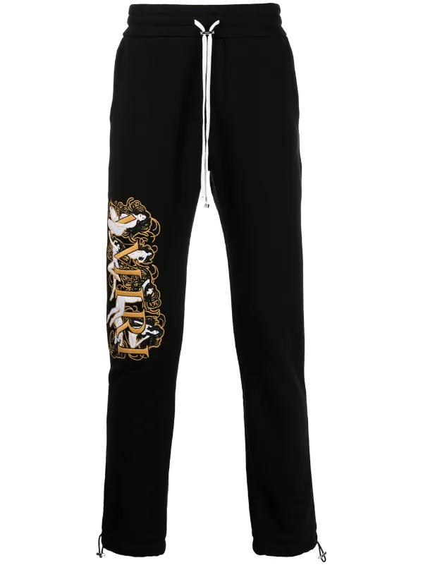 amiri track pants