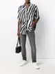 Image 2 of AMIRI distressed-effect slim-fit jeans
