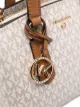 Michael Michael Kors Bolsa tote Voyager monogramada de couro