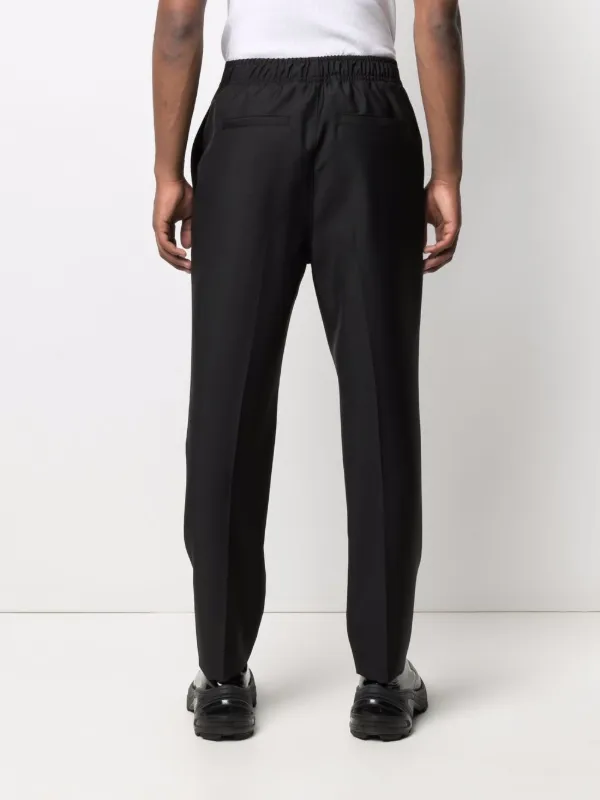 Wool Slim Fit Pants in Black  Givenchy  Mytheresa