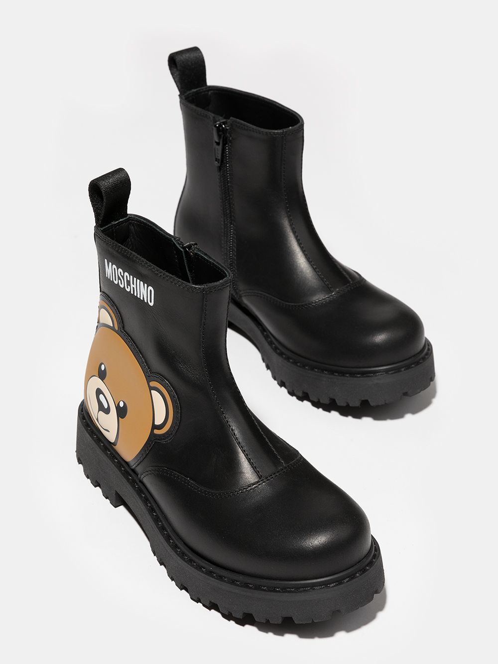 Shop Moschino Teddy Logo Ankle Boots In Black
