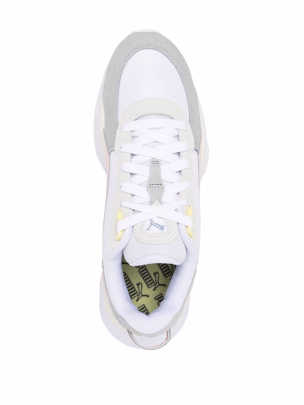 Shop Puma Wild Rider Rollin Sneakers In White