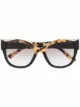 Imagem 1 de Prada Eyewear Óculos de sol oversized com efeito tartaruga
