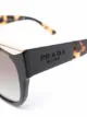Prada Eyewear Óculos de sol oversized com efeito tartaruga