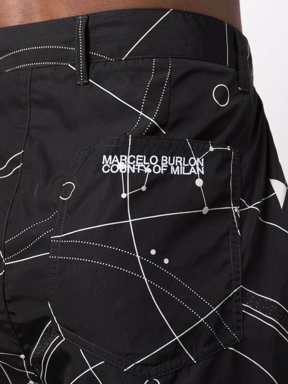 Shop Marcelo Burlon County Of Milan All Over Astral Pleated Chinos In 黑色