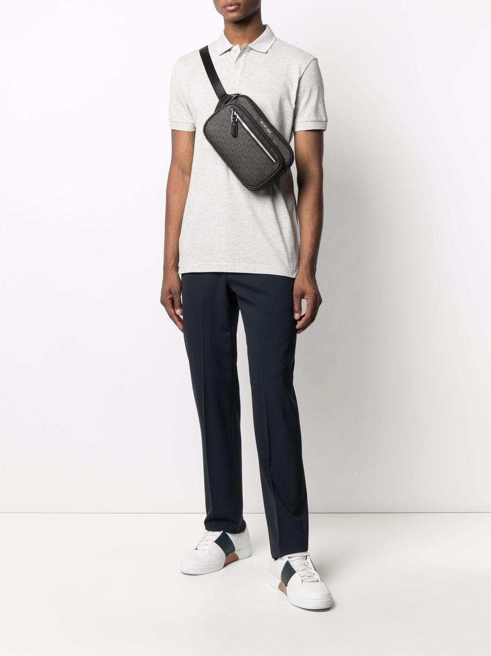 Shop Michael Kors Monogram Zipped Belt Bag In Black