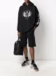 Image 2 of VETEMENTS logo-tape track shorts