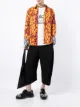 Image 2 of Black Comme Des Garçons x Filip Pagowski print cut-out cuff shirt