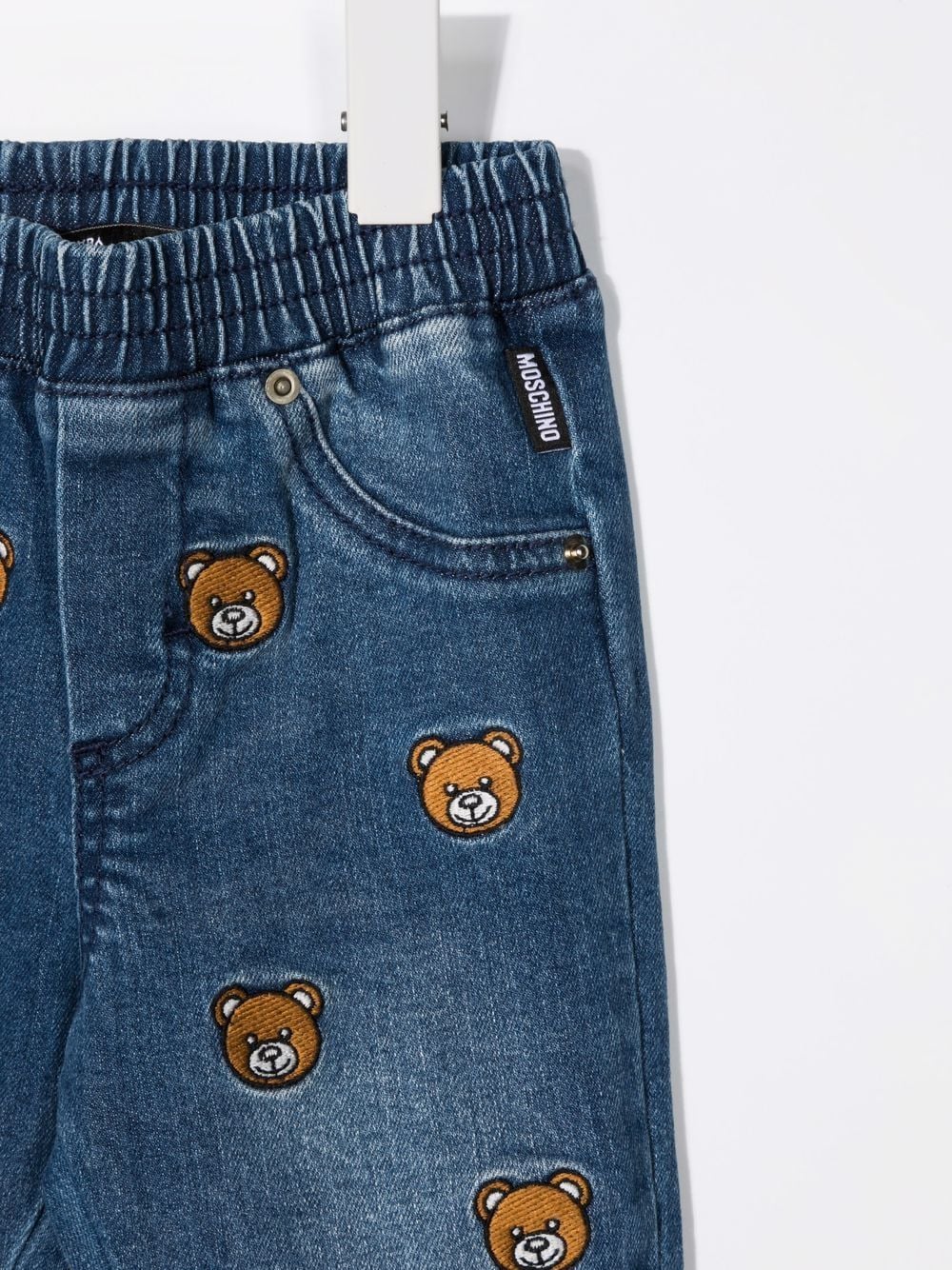 Shop Moschino Embroidered Teddy Bear Jeans In 蓝色