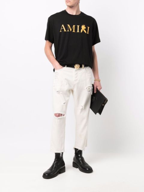 Shop AMIRI logo-print short-sleeved T-shirt with Express Delivery ...