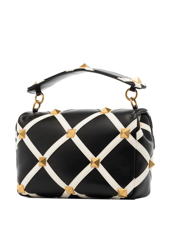 Shop Valentino Garavani Roman Stud shoulder bag with Express 