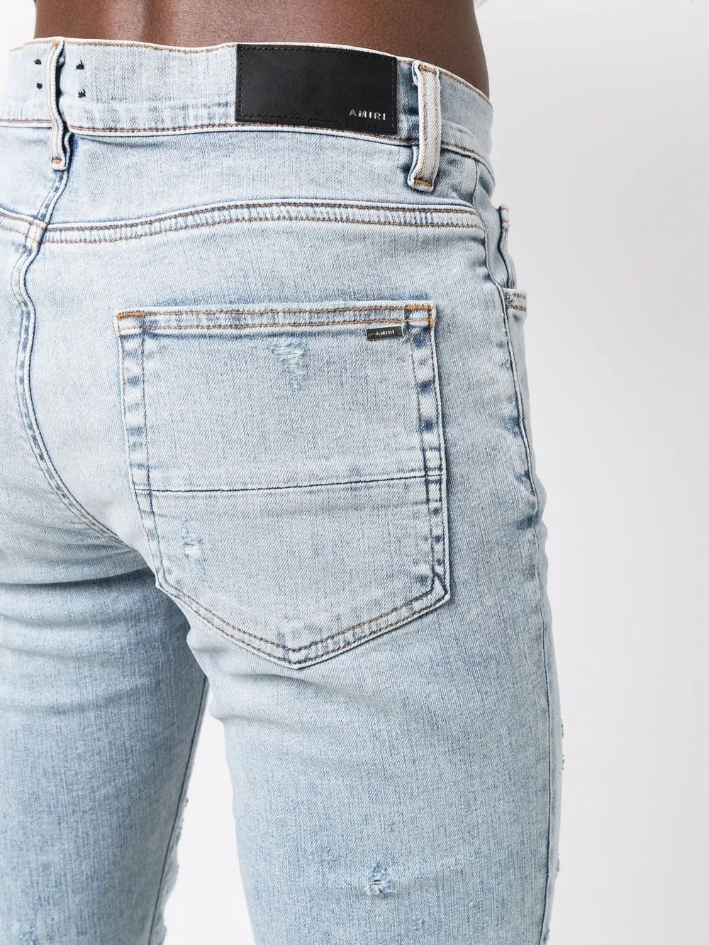 фото Amiri джинсы скинни с эффектом потертости