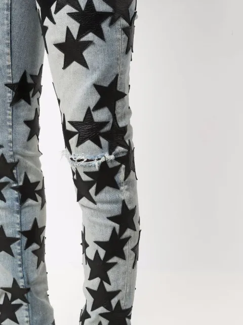 amiri jeans with black stars