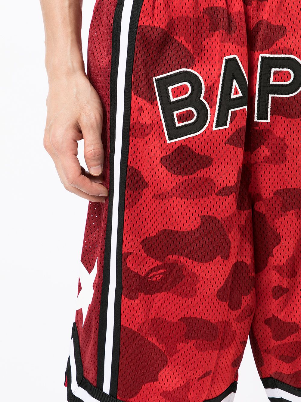 фото A bathing ape® сетчатые шорты с камуфляжным принтом